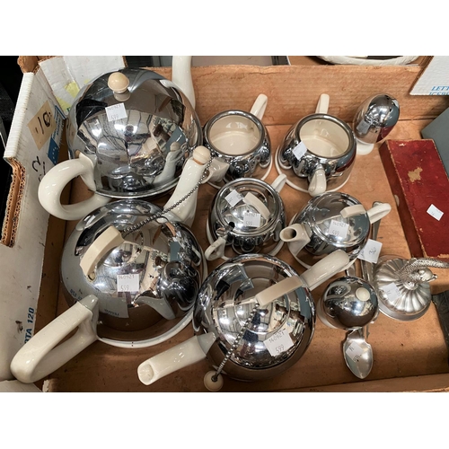 599 - A selection of Art Deco 'Mushroom' teapots in chrome and white pottery; a canteen of stainless steel... 