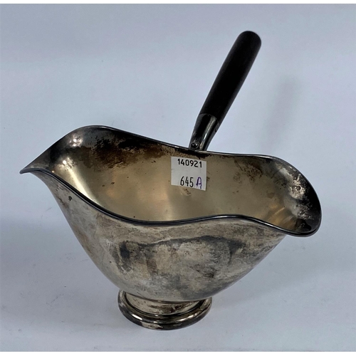 645A - A Swedish white metal double lipped sauce boat with side handle, three crowns mark, 4oz, 130gms.