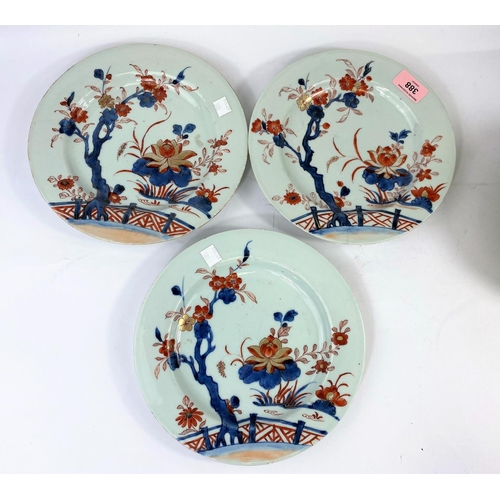 388 - Three 19th century Chinese Imari plates decorated with flowers in blues, reds and gilt; diameter 23c... 