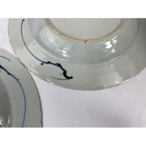 388 - Three 19th century Chinese Imari plates decorated with flowers in blues, reds and gilt; diameter 23c... 