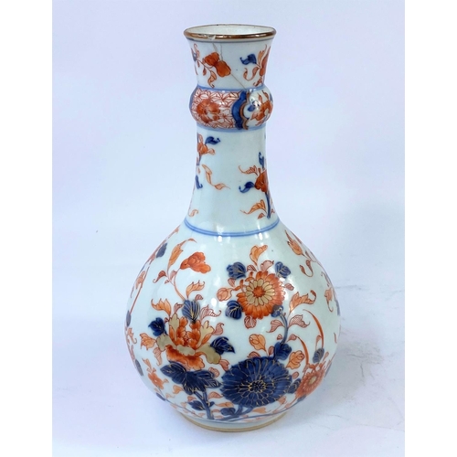 388A - A 19th century Chinese Imari pattern bottle vase with knot in the neck; Height 22cm (4cm hairline cr... 