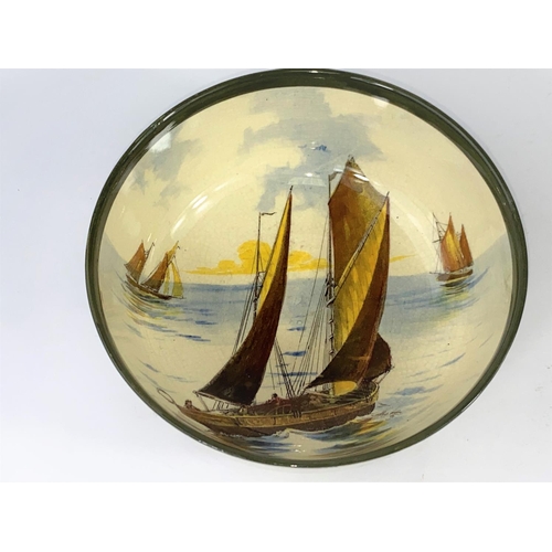 437B - A Royal Doulton - decorated with sailing boats to the interior and exterior