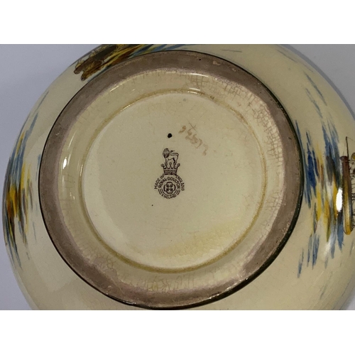 437B - A Royal Doulton - decorated with sailing boats to the interior and exterior