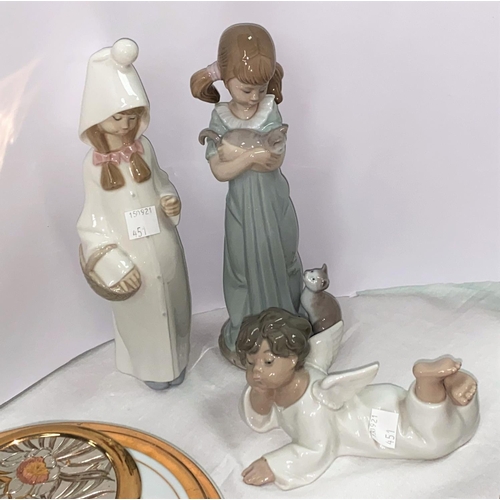 451 - Three Lladro figures:  girl with kitten, height 29 cm; girl with basket (stick missing); and cherub