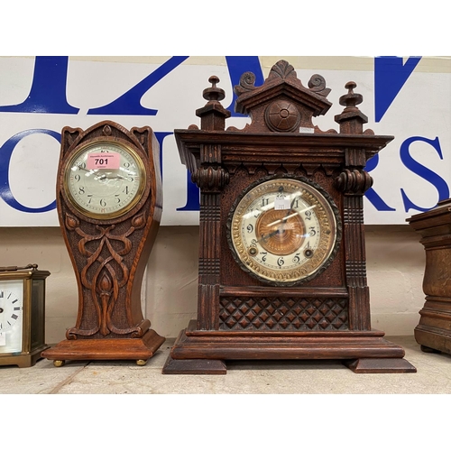 701 - A mantel clock in Art Nouveau carved oak case, with French drum movement, height 30; an Edwardian ma... 