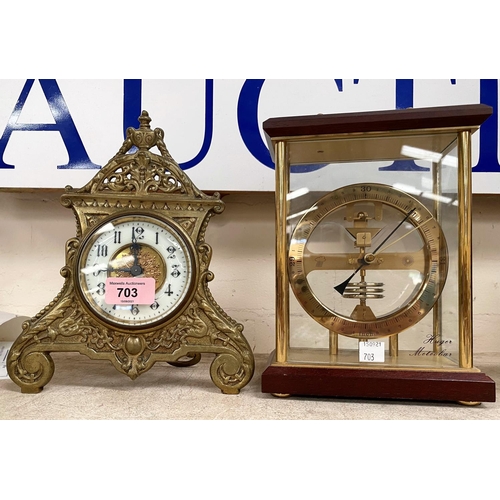 703 - An Edwardian mantel clock in ornate brass case; a desk top barometer a modern  'Hugo Metobar' barome... 
