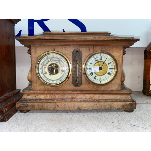 704 - An Edwardian clock/barometer/thermometer in stained wood case