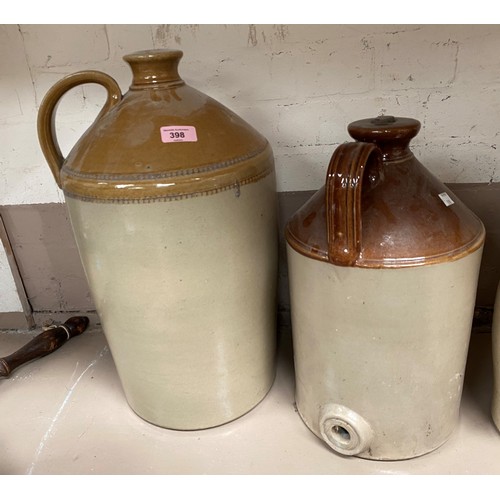 398 - A large 4 gallon stoneware flaggon and a similar smaller flaggon.