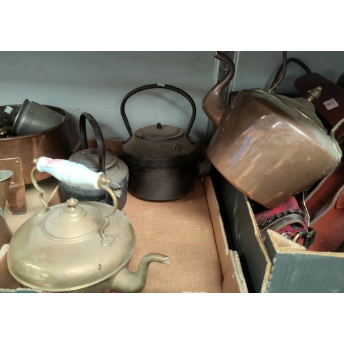 11 - A 19th century copper kettle; a brass and 2 cast iron kettles