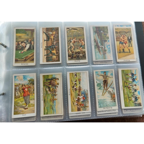 114A - An album of 32 sheets of part sets of cigarette cards, including Ogdens, Faulkner, Hignetts etc.
