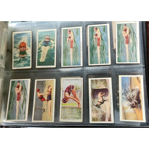 114B - An album of 37 sheets of part sets of cigarette cards Ogdens, including tabs.