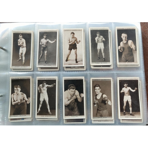 114C - An album of 36 sheets of part sets of cigarette cards Ogdens, including tabs.
