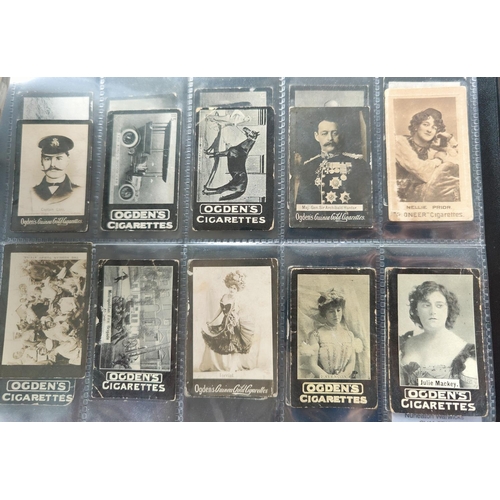 114C - An album of 36 sheets of part sets of cigarette cards Ogdens, including tabs.