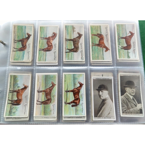 115A - An album of 37 sheets of part sets of cigarette cards including Ogdens etc.