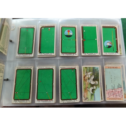 115A - An album of 37 sheets of part sets of cigarette cards including Ogdens etc.