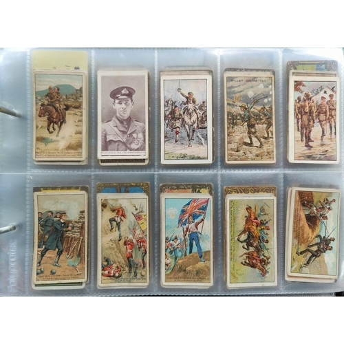 115C - An album of 30 sheets of rarer single cigarette cards etc.