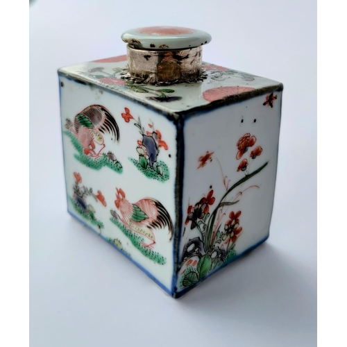 301B - A Chinese porcelain tea caddy decorated with flowers and cockerels, with a white metal mount and por... 