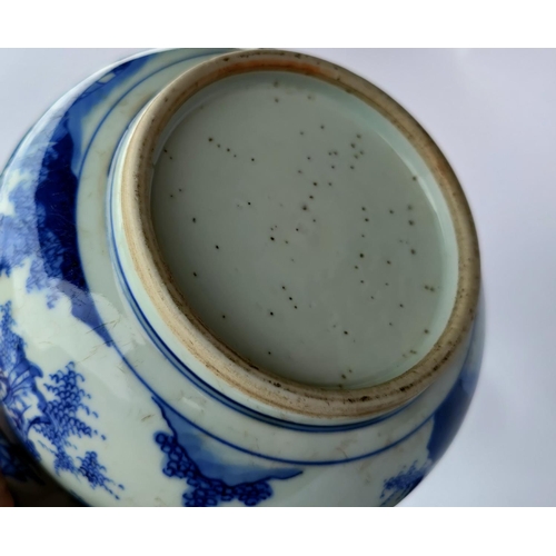 391G - A Chinese blue and white spittoon on a hardwood stand.  Diameter: 20cm (some wear to glaze internall... 