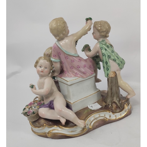 472B - A Meissen ceramic group of 4 cherubs making flower chains, crossed sword marks to base, numbered 250... 