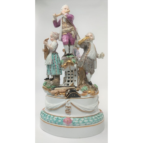 472D - A Meissen figural group centre piece of 4 musicians, 2 males, 2 females attop a pierced stand, cross... 