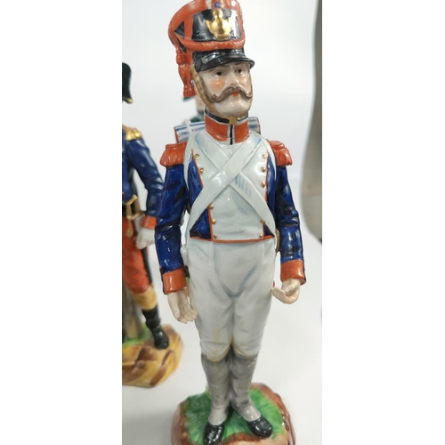 472F - A collection of Fourteen Sevres porcelain Napoleonic era soldiers in various colonial uniforms, all ... 