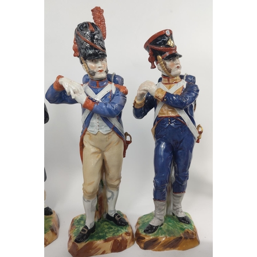 472F - A collection of Fourteen Sevres porcelain Napoleonic era soldiers in various colonial uniforms, all ... 