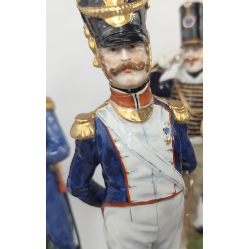 472F - A collection of Fourteen Sevres porcelain Napoleonic era soldiers in various colonial uniforms, all ... 