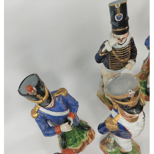 472F - A collection of Fourteen Sevres porcelain Napoleonic era soldiers in various colonial uniforms, all ... 