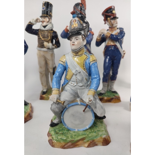 472F - A collection of Fourteen Sevres porcelain Napoleonic era soldiers in various colonial uniforms, all ... 