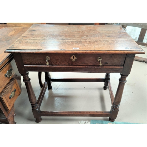693 - An early 19th century oak country made side table with frieze drawer and brass drop handles, width 8... 