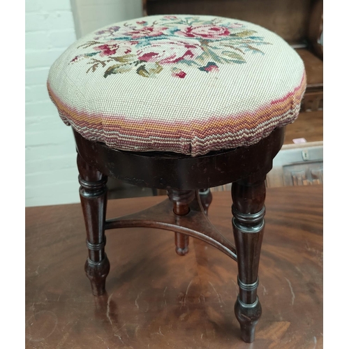 705 - A Victorian mahogany revolving piano stool; an Edwardian walnut Sutherland table

NO BID SOLD WITH N... 