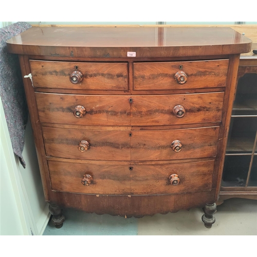 740 - A Victorian mahogany bow front chest of 3 long and 2 short drawers on turned legs