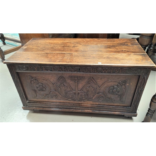 756 - A carved oak blanket box 