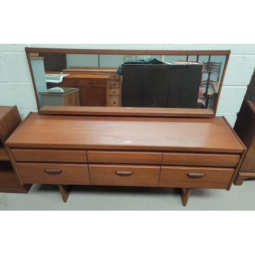 774 - A mid century teak dressing table by William Lawrence with 6 drawers beneath and long mirror H120 x ... 
