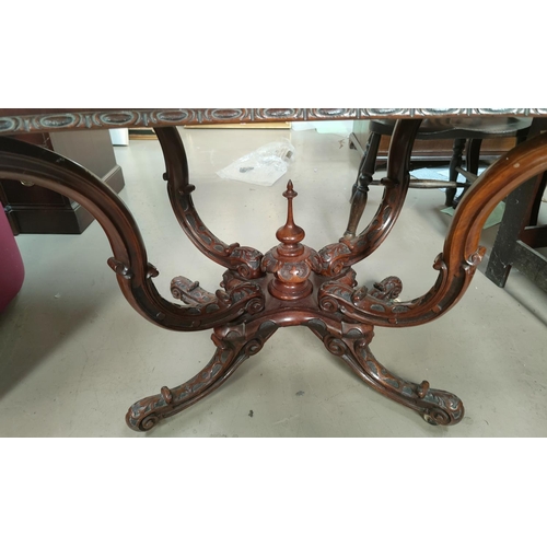 835 - A victorian shaped rectangular quarter veneered burr walnut centre table on carved scroll supports, ... 