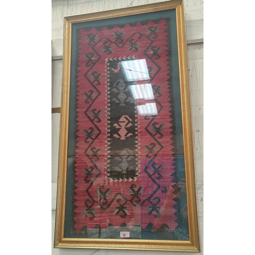 92 - A Kelim rug, late 19th century Anatolia, 45 x 95 cm, framed, Howard Francis Gallery label