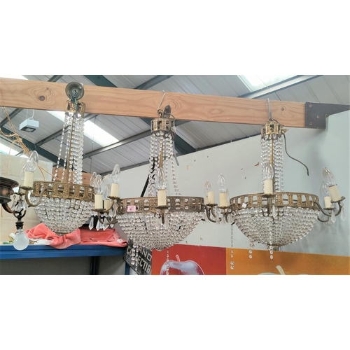 45 - A pair of 6 branch centre light fittings/chandeliers in gilt metal and faceted glass beads; a simila... 