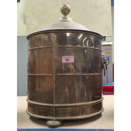 55 - A brass coal bin; a large copper jug and metalware