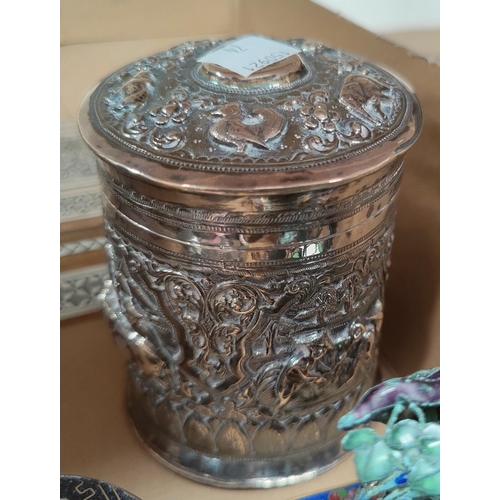 74 - A Sri Lankan covered jar in white metal with extensive relief decoration; 2 pieces of cloisonné; an ... 