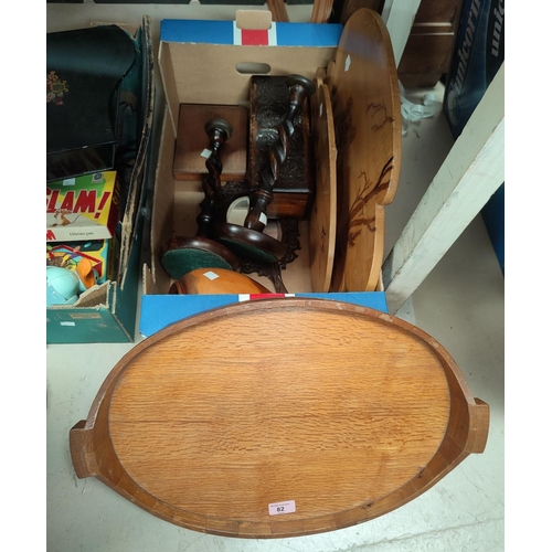 82 - A coopered oak oval tray, 53 cm; a pair of barley twist candlesticks, 32 cm; other treen