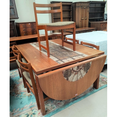 840 - A mid century teak dining suite, the table with a central tiled section of circular design in the ma... 