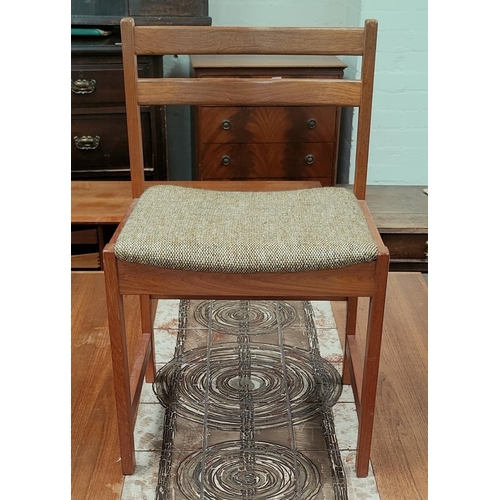 840 - A mid century teak dining suite, the table with a central tiled section of circular design in the ma... 