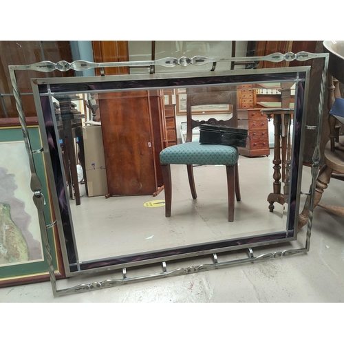 844a - a large heavy metal and stained glass frame bevel edge mirror, 93 x 67cm