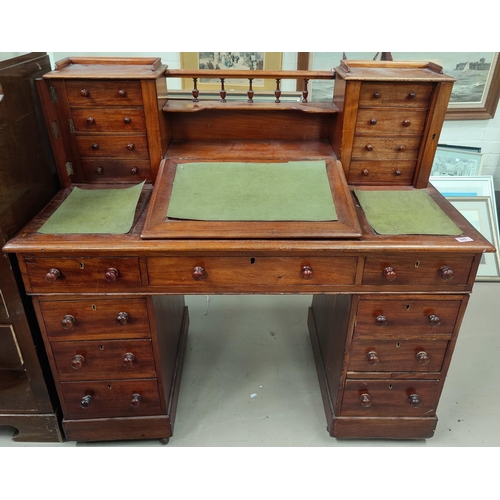 845 - A late 19th, early 20th century high backed twin pedestal desk with four hight drawers to back galle... 