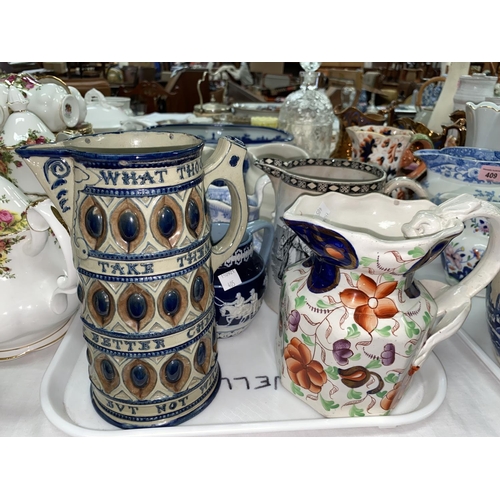 405 - A collection of Victorian and later jugs; a modern blue & white footbath