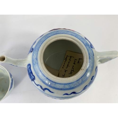 353 - A Chinese porcelain blue and white tea pot decorated with traditional scenes, (hairline cracks); a C... 