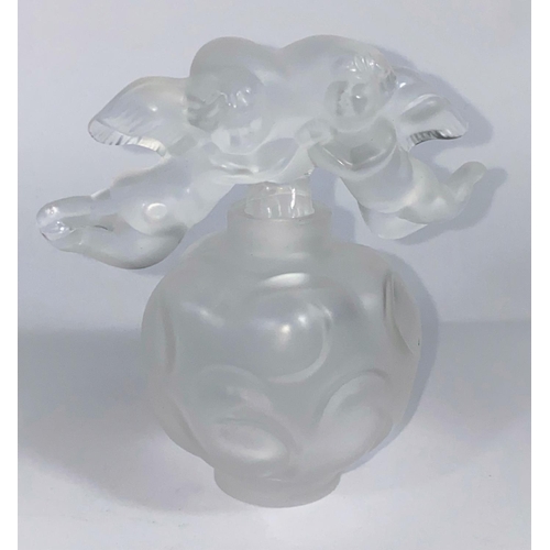 417D - A Lalique globular scent bottle with cherub heart stopper, etched signature to the base H10cm