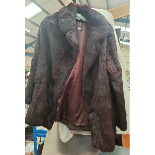 41 - A ladies full length brown mink coat; a Coney jacket; hats; etc.