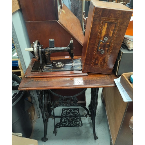 93 - A 19th century treadle sewing machine by Seidel and Naumann, with ornate cast iron base, 74 cm