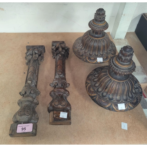 95 - A pair of carved wooden finials, ht. 19cm and 2 carved wooden fittings